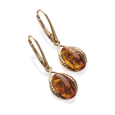 Baltic Amber Earrings featuring polished amber stones set in gold-plated sterling silver with intricate detailing, designed for elegant female jewelry collections.