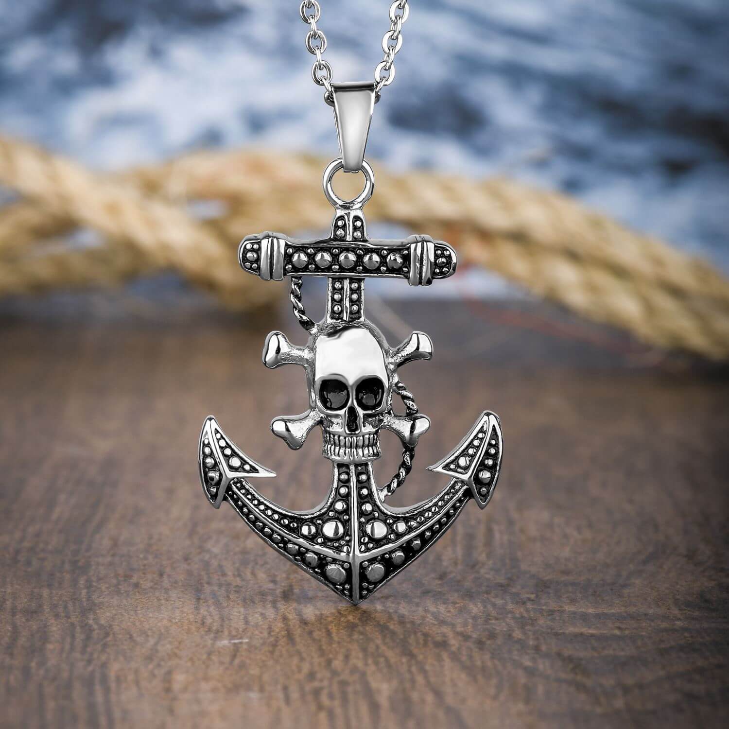Anchors Aweigh Skull Pendant made of two-tone stainless steel featuring a detailed skull and anchor design on a matching chain, ideal for men's jewelry collections.