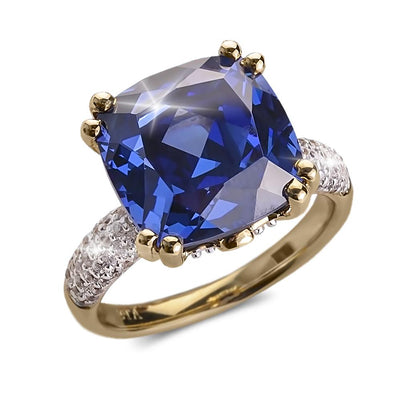 Helena Ring featuring a large cushion-cut blue gemstone set in a gold-plated sterling silver band with pavé white stones, crafted for women’s jewelry.