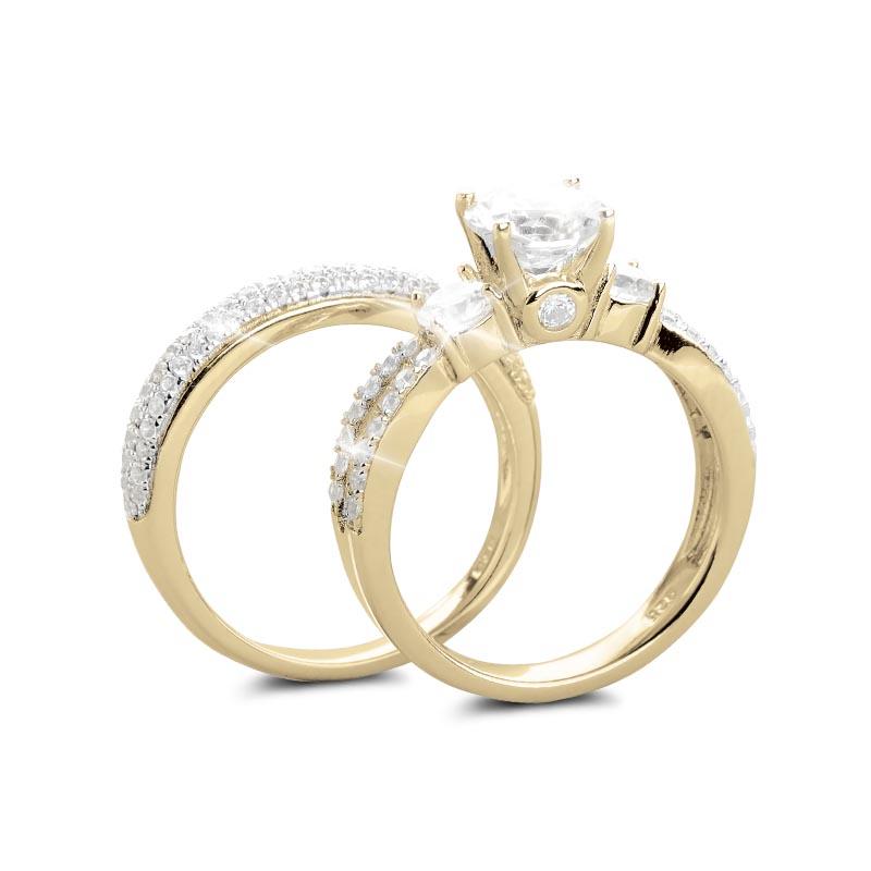 Serenade Duo Bridal Ring set featuring sterling silver with gold plating, showcasing a sparkling center stone ring paired with a complementary pave diamond band, designed for women.