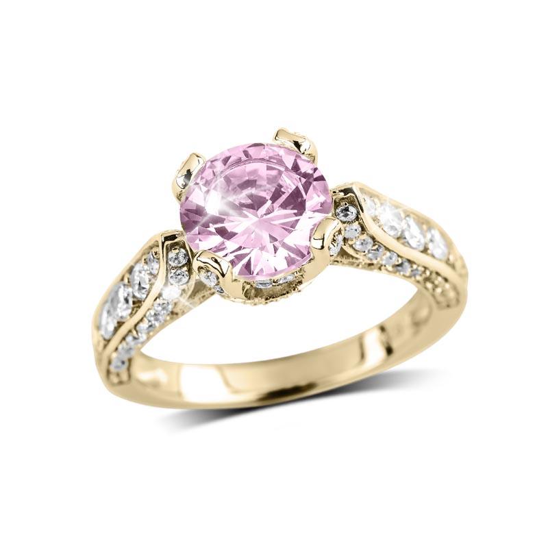 Millionaire Pink Argyle Ring featuring a sterling silver gold-plated band adorned with clear gemstones and a large round pink center stone, designed for women’s jewelry collections.