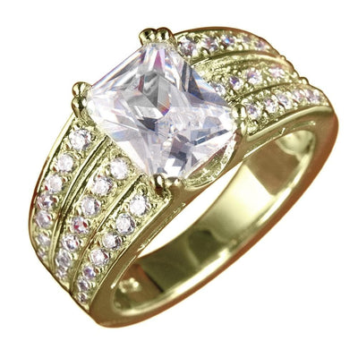 Princess Ring (Gold) featuring a square-cut clear gemstone centerpiece set in sterling silver with gold plating, adorned with multiple small sparkling stones along the band for elegant jewelry style.