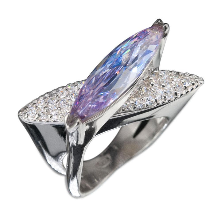 Blue Sculpture Ring featuring a large marquise-cut blue gemstone set in sterling silver with rhodium plating and accented with small sparkling stones, designed for women.