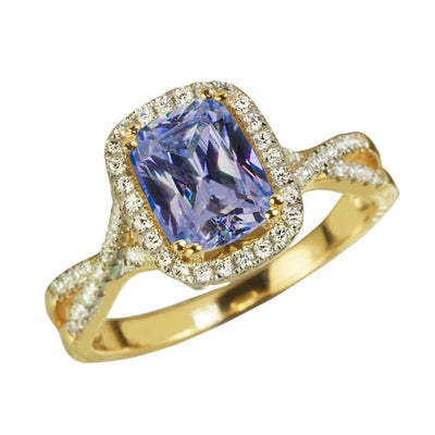 Tanzanite Twist Ring featuring a rectangular tanzanite center stone surrounded by pavé diamonds on a gold-plated sterling silver twisted band designed for female jewelry.