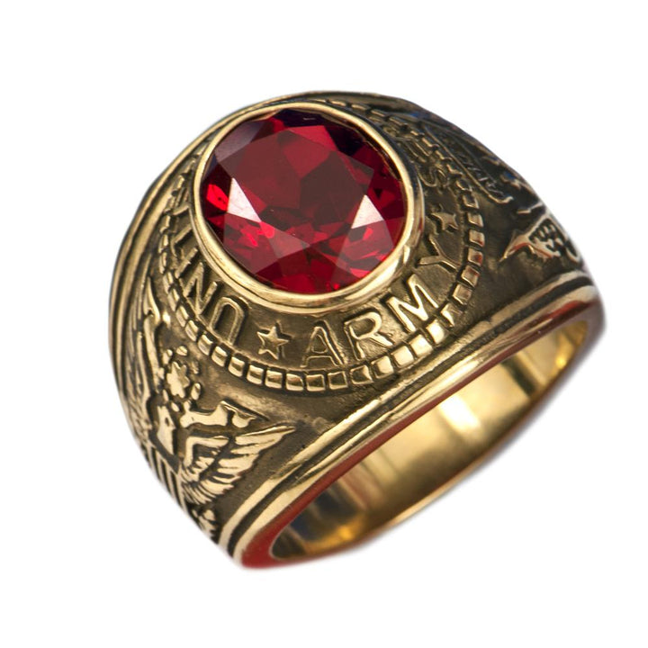 Army Ring crafted from gold-plated stainless steel featuring a large red gemstone and detailed military-inspired engravings, designed for men’s jewelry collection.