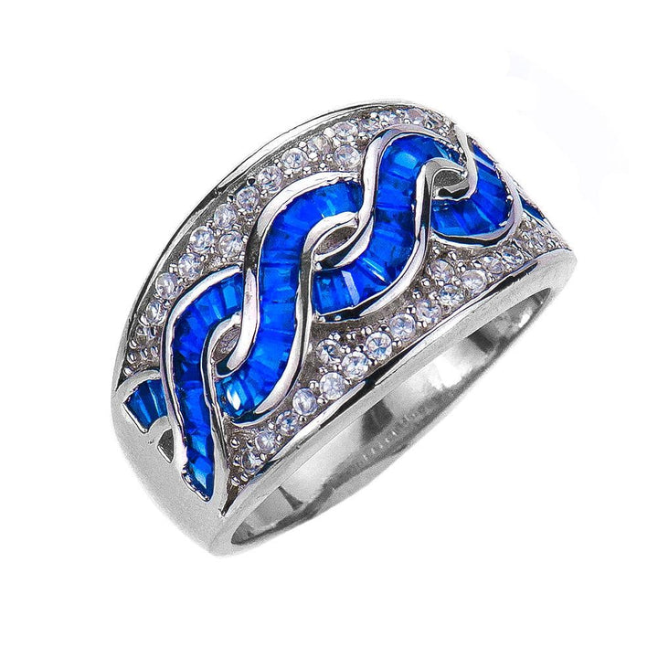 Charleston Ring featuring sterling silver with rhodium plating, designed for female jewelry lovers, showcasing a twisted blue gemstone pattern accentuated by small clear crystals.