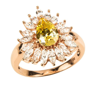 Canary Pear Ring featuring a pear-shaped yellow gemstone surrounded by marquise-cut clear stones, set in sterling silver with gold plating, designed for female jewelry lovers.